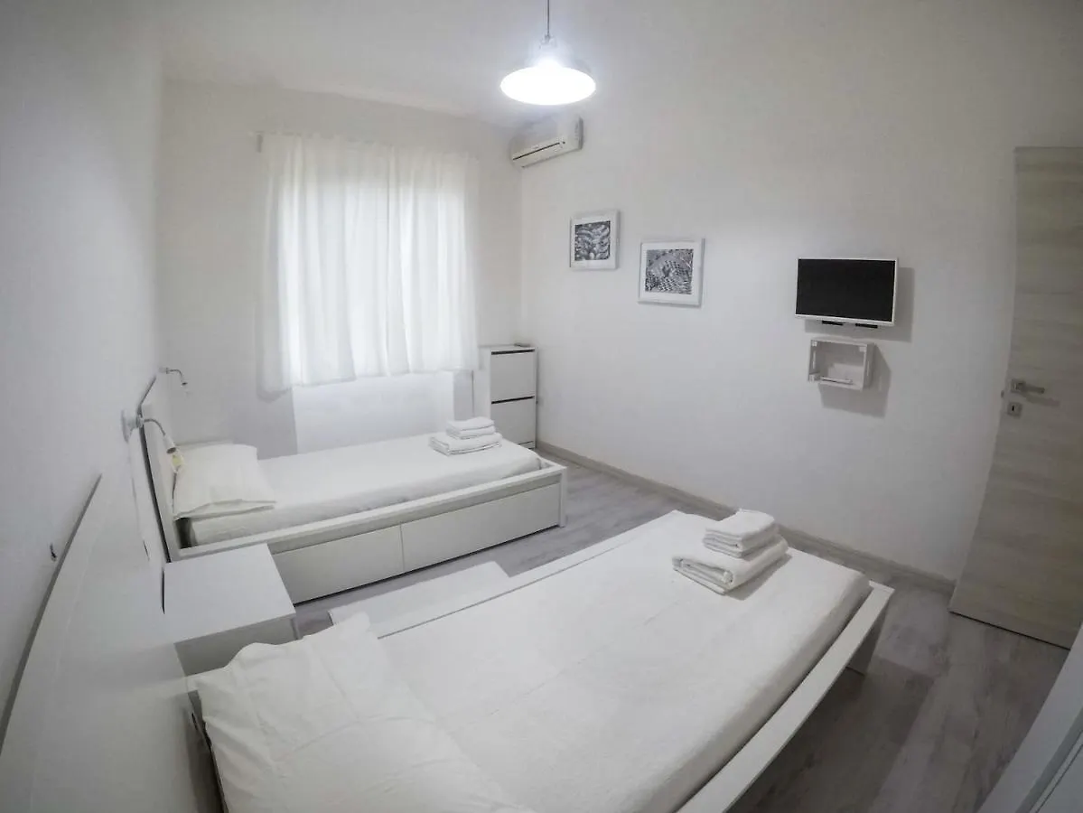 Black&White Guest House Iglesias Feriehus